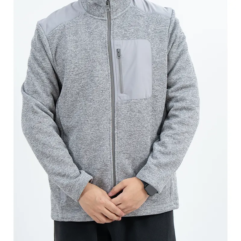 Graue Stehkragen-Reißverschlussjacke mit glatten Schulter- und Brusteinsätzen Graue Stehkragen-Reißverschlussjacke mit glatten Schulter- und Brusteinsätzen